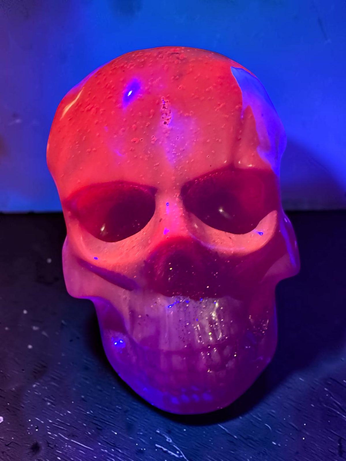 UV Reactive Neon Red Resin Skull with Gold Glitter