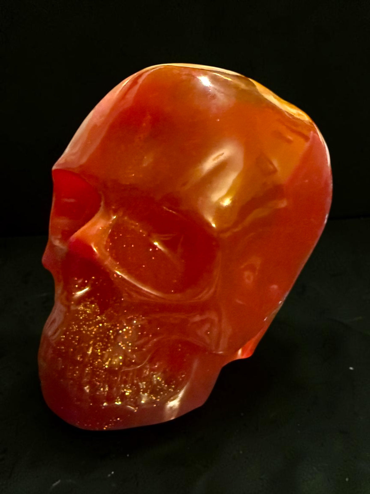 UV Reactive Neon Red Resin Skull with Gold Glitter